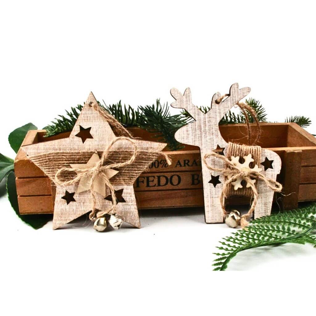 Wooden star and reindeer ornaments with jingle bells on a white background