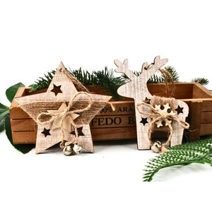 Wooden star and reindeer ornaments with jingle bells on a white background
