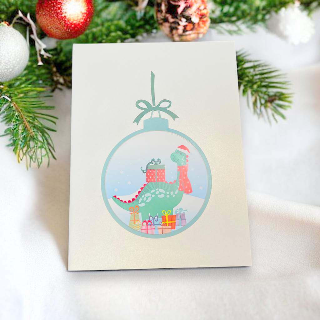 Green Baby Dinosaur with Christmas Present Pop Card