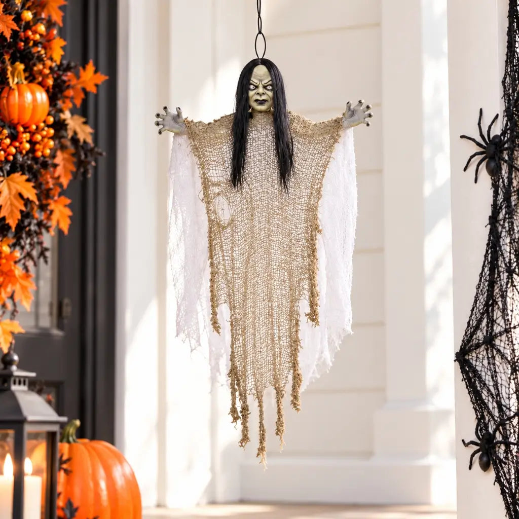 Scary girl decoration wearing ragged white fabric and mesh robes