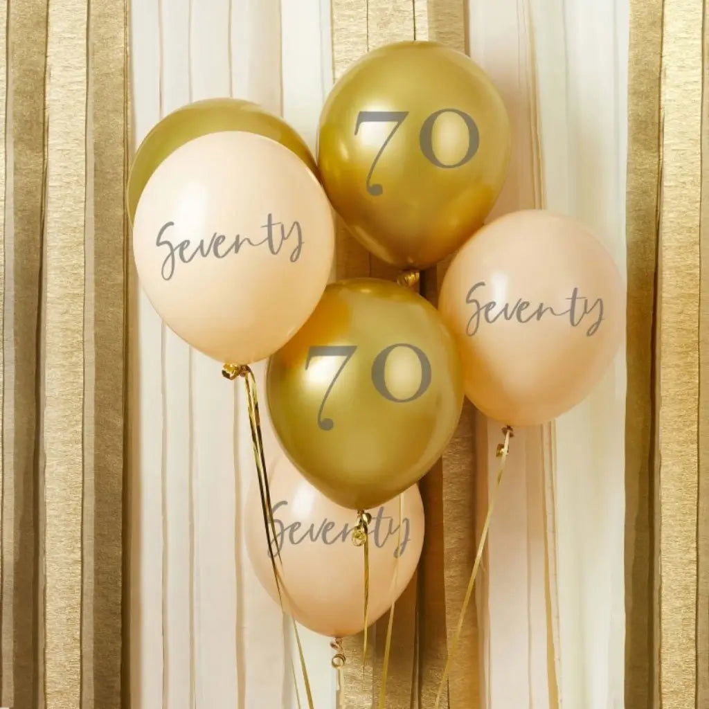  Gold and ivory 70th birthday latex balloons measuring 30cm