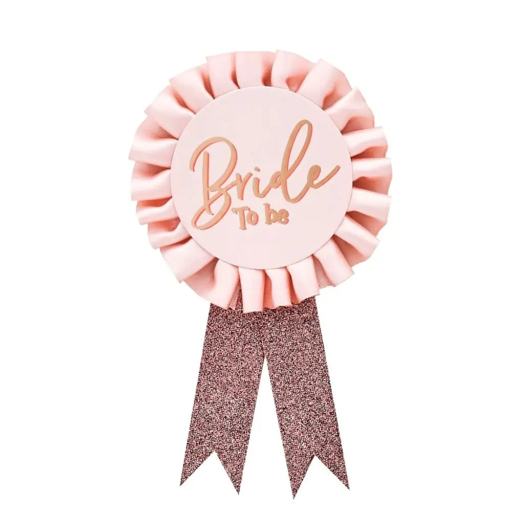 She Said Yaaas Bride Badge blush pink rosette with rose-gold glitter ribbons