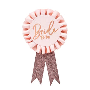 Bride To Be blush pink satin badge for hen party or bridal shower