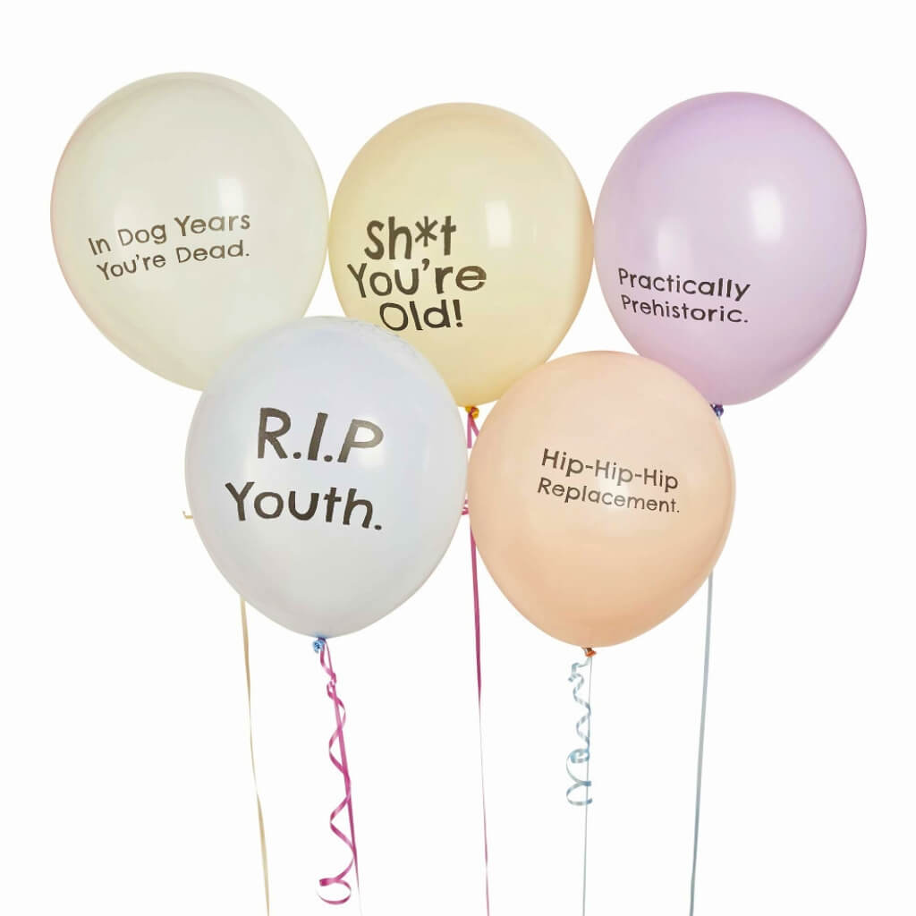 Pack of 5 cheeky 30cm latex birthday balloons with humorous slogans including Sh*t You’re Old.