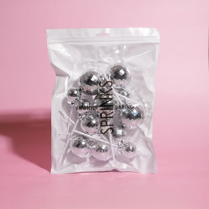 Silver mirror ball cake picks in a 12-piece set