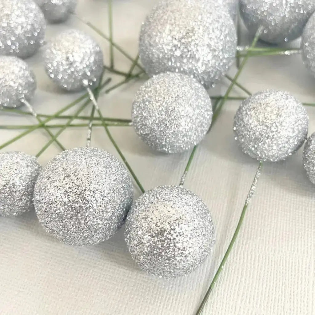 Glitter silver cake topper balls in assorted sizes