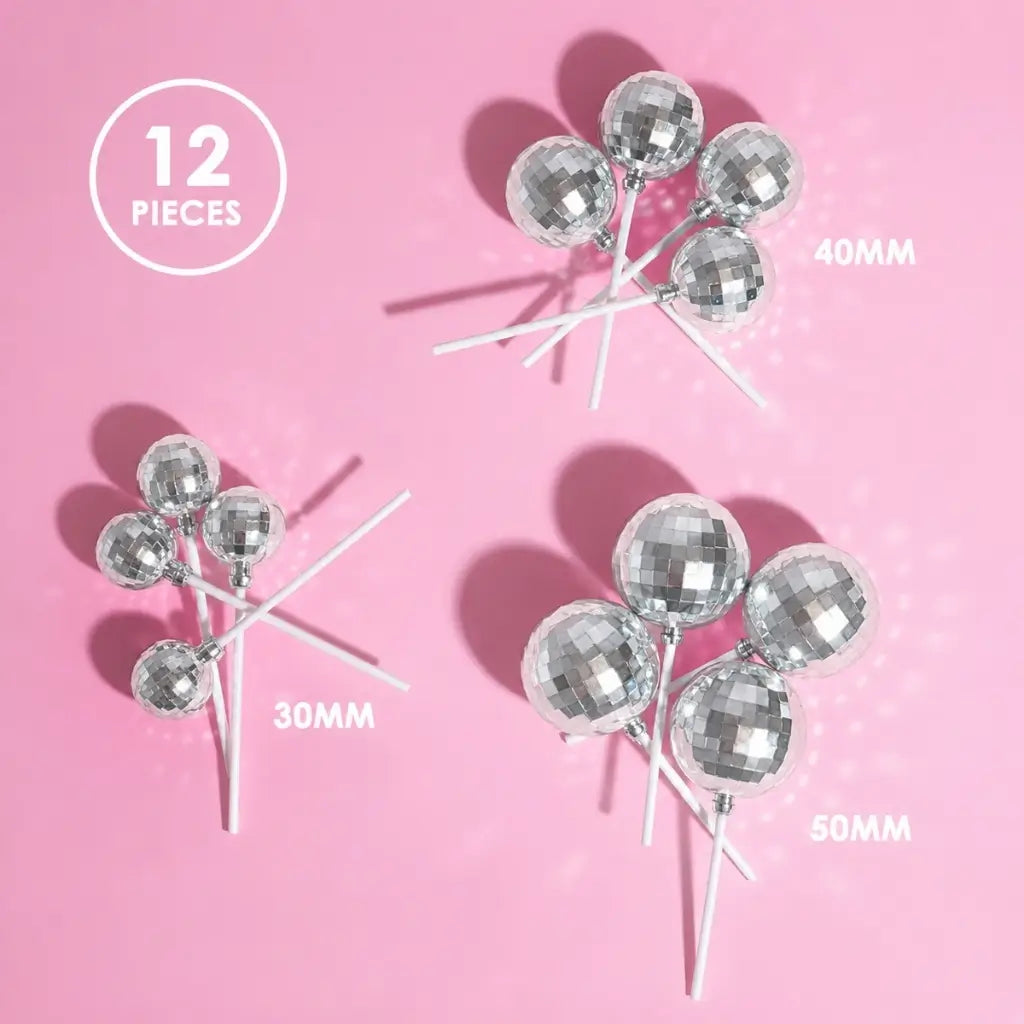 Silver disco cake toppers in three assorted sizes