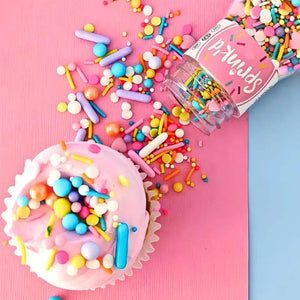 Bubble Tea Medley sprinkles scattered on a pastel purple cupcake