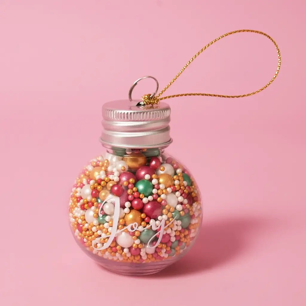 Sprinks Merry Minis festive baking gift in a reusable glass bauble