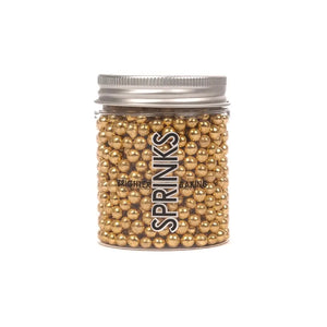 Metallic gold cachous sprinkles for dessert decoration