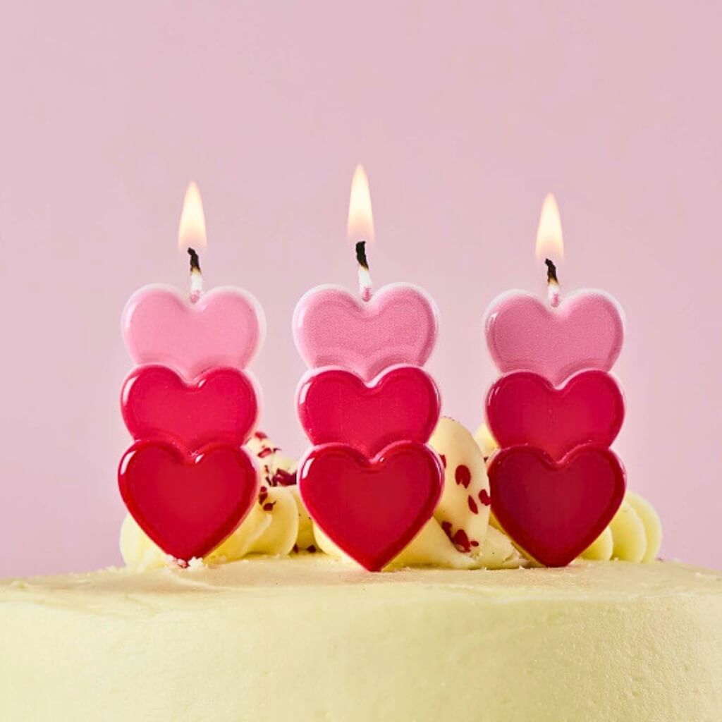 Pink and red stacked heart cake candles pack of three