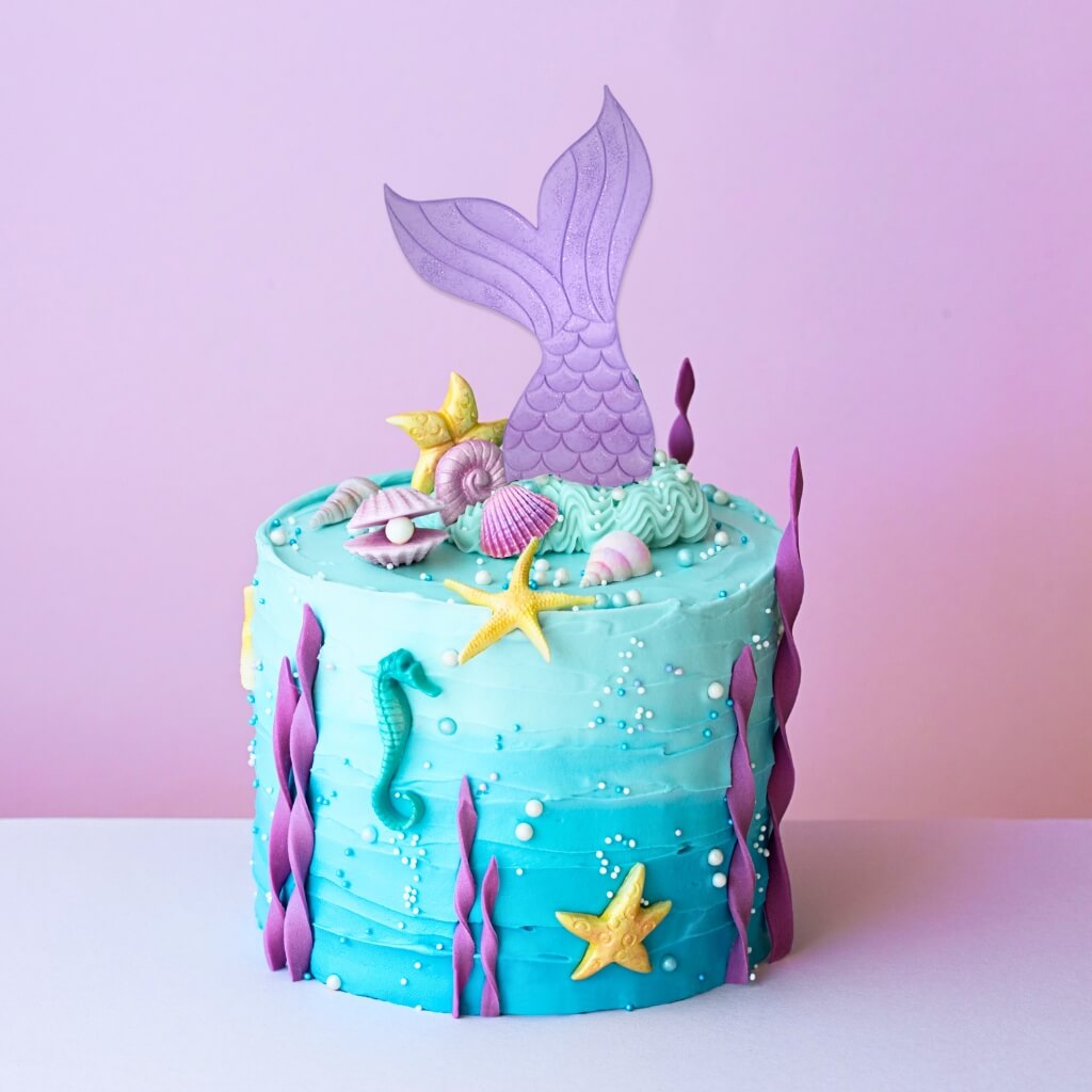 mermaid themed cookies shaped like tails