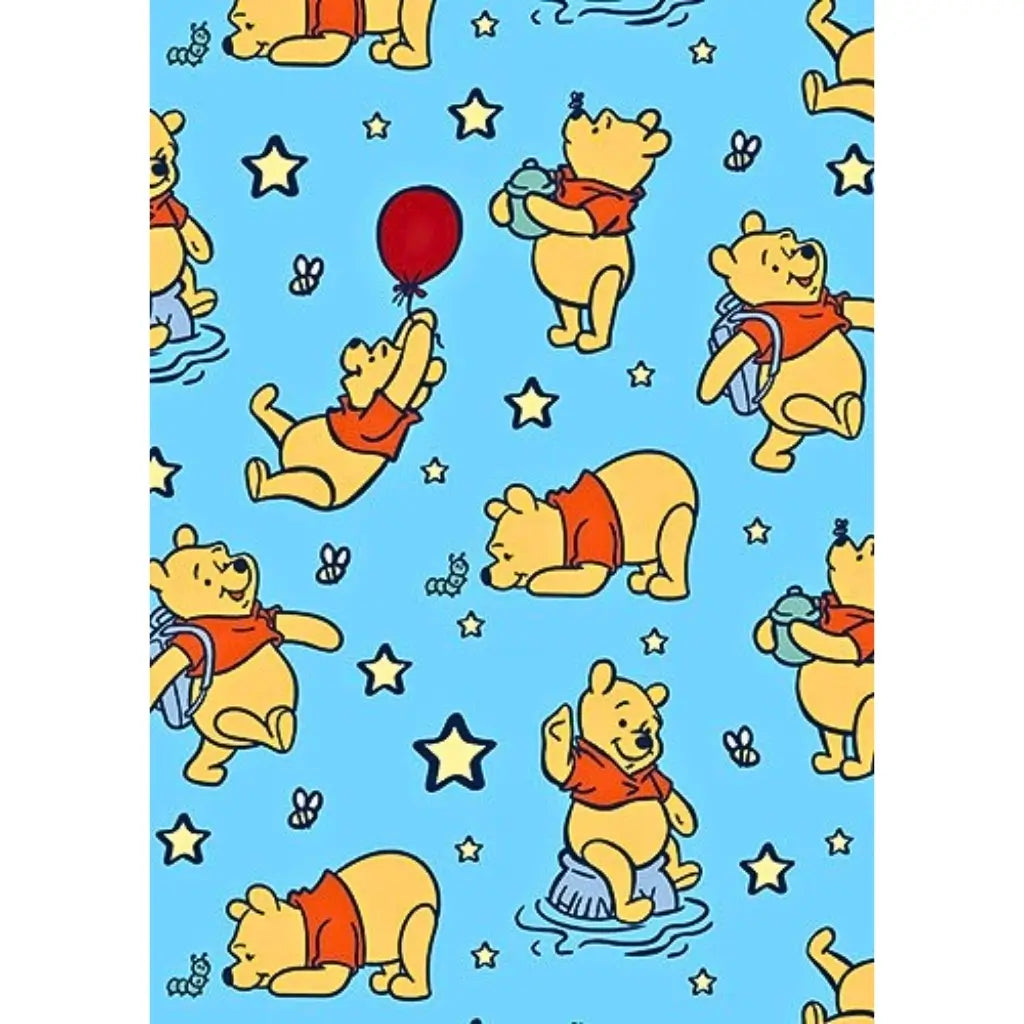 Winnie the Pooh wrapping paper sheet with stars design