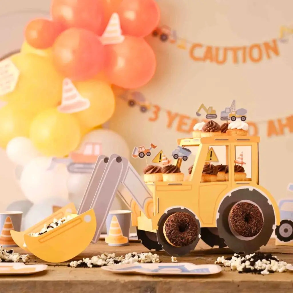 Diggin’ It yellow digger truck treat stand