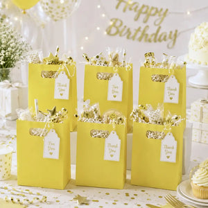 Yellow party bags for birthday party favours