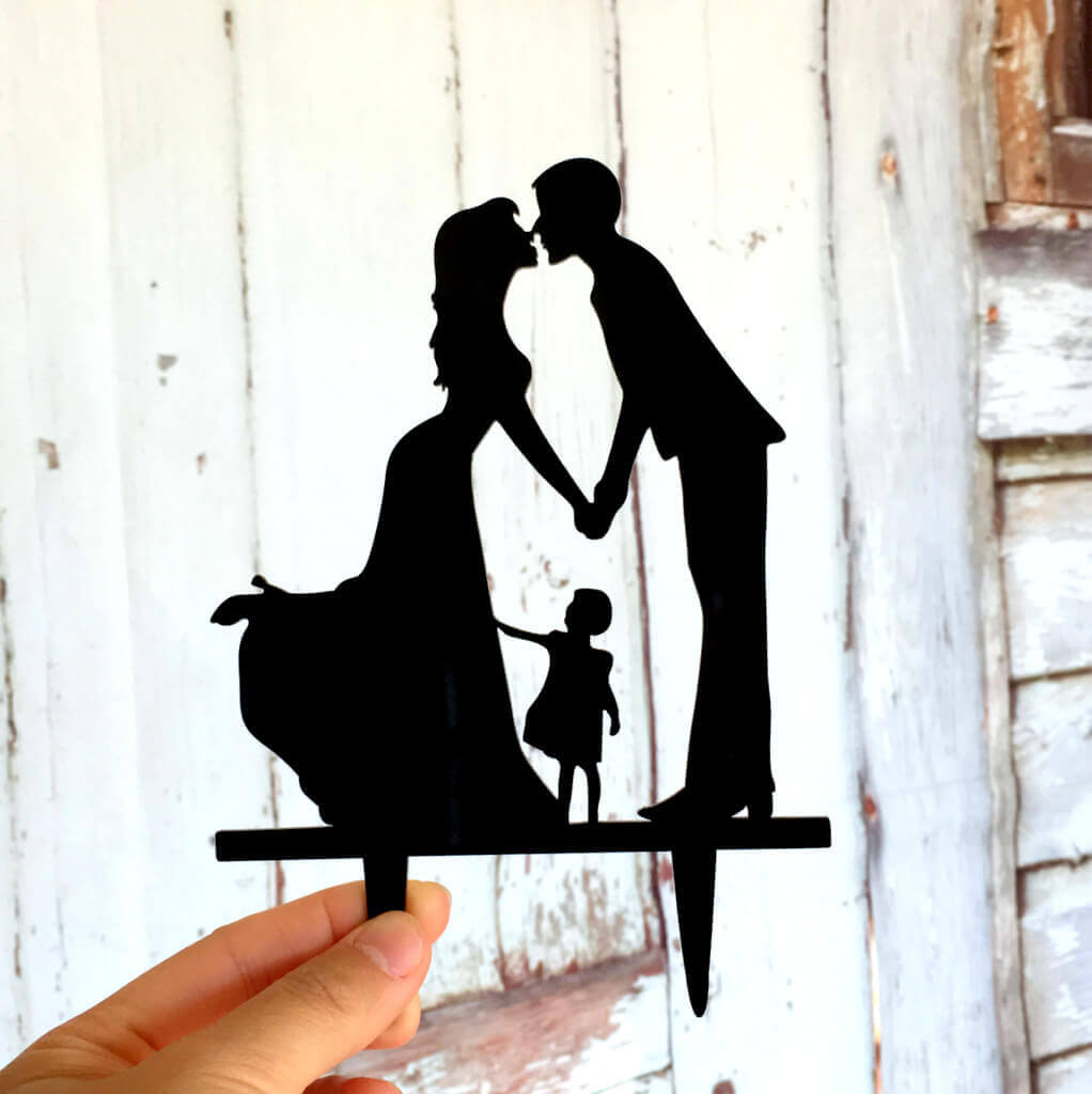 Silhouette Kissing Bride and Groom with a Girl Wedding Family Cake Topper