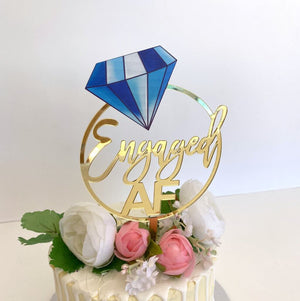 Acrylic Gold Mirror Engaged Loop with Blue Diamond Cake Topper