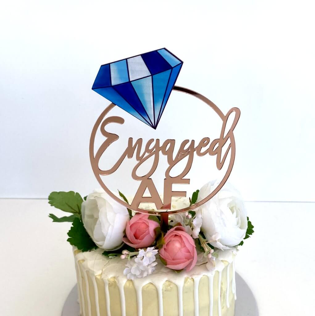 Acrylic Rose Gold Mirror Engaged Loop with Blue Diamond Cake Topper