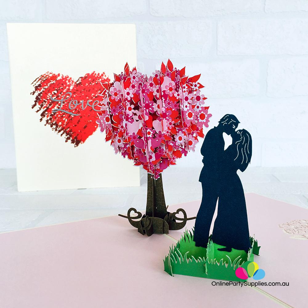 Handmade Silhouette Couple Kissing Near Pink Heart Tree 3D Pop Up Card - Online Party Supplies