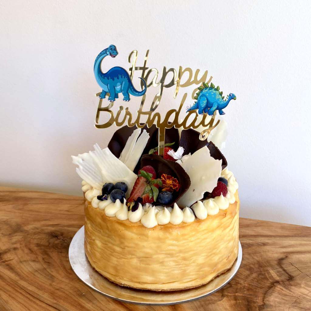 Laser Cut Gold Mirror Acrylic Happy Birthday Script with Blue Dinosaur Cake Topper
