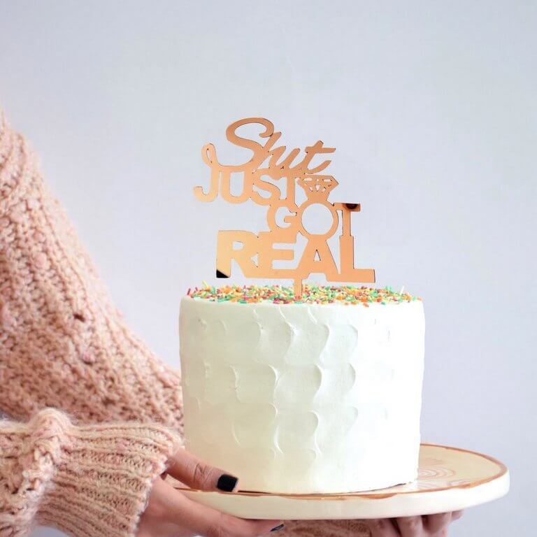 Rose Gold Mirror Acrylic 'Shit Just Got Real' Engagement Cake Topper