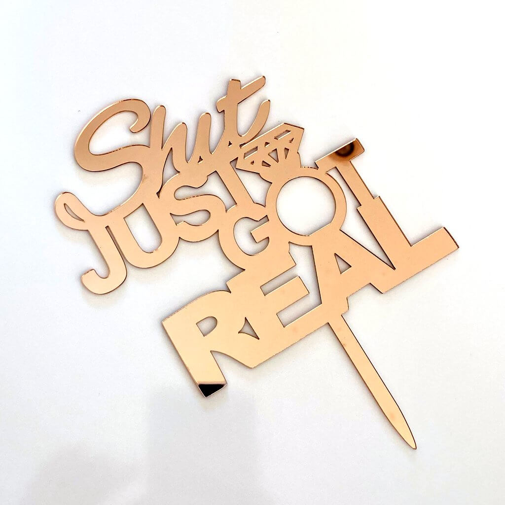Rose Gold Mirror Acrylic 'Shit Just Got Real' Engagement Cake Topper