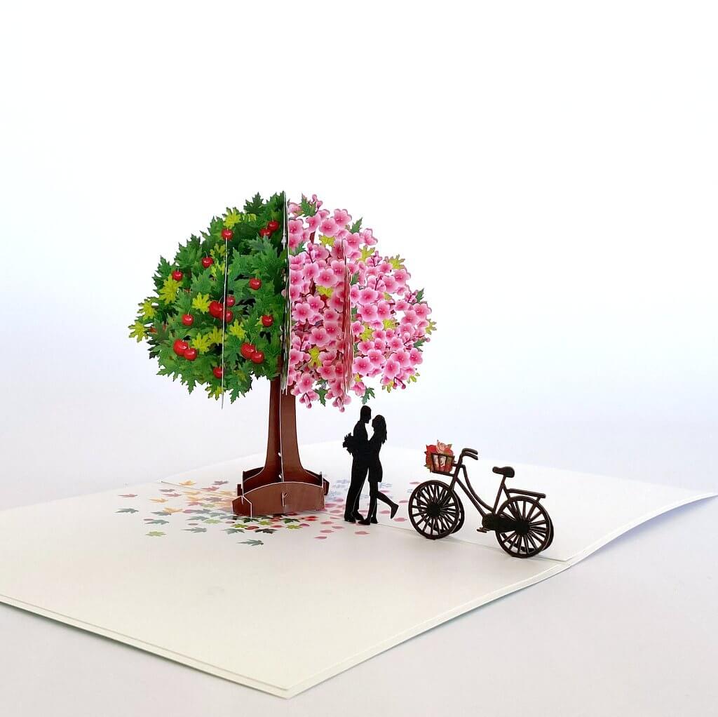 Luxury Silhouette Couple Kissing Under a Magical Four Season Tree Pop Up Card